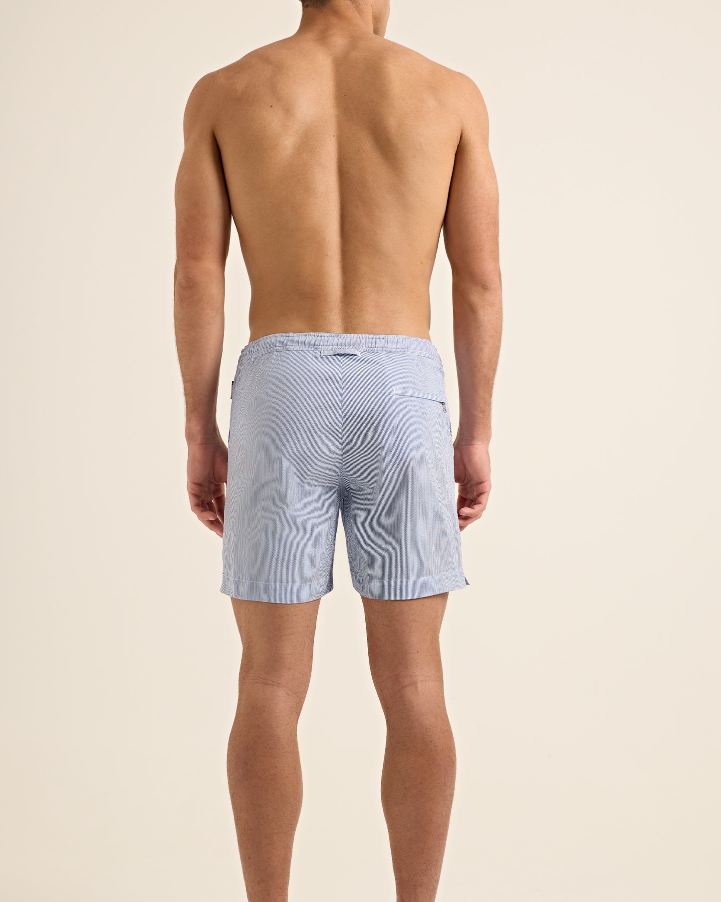 Bulldog Drawcord - Mid-Length Seersucker Stripe Drawcord Swim Shorts in Catalina Blue/White Stripe Model Back