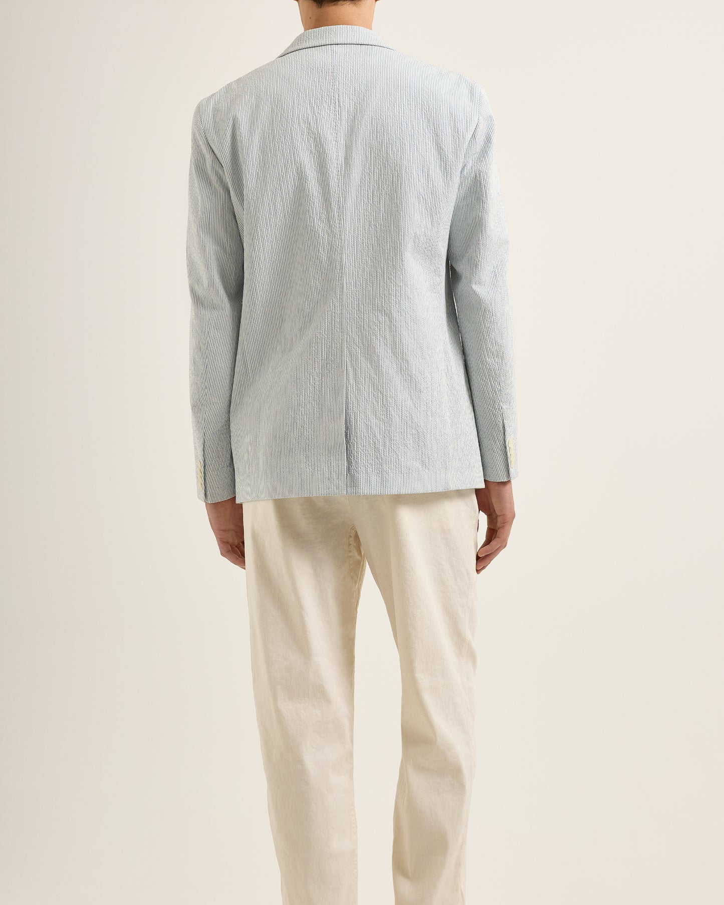 Garret Seersucker - Tailored Fit Unstructured Two-Button Italian Seersucker Blazer in Blue/White Model Back