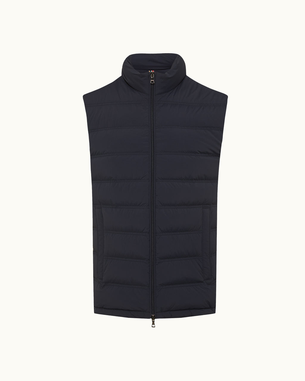 Black puffer vest on a white background