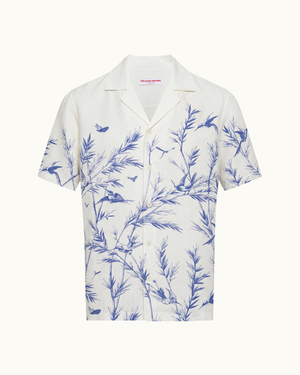 White shirt with blue floral pattern on a white background