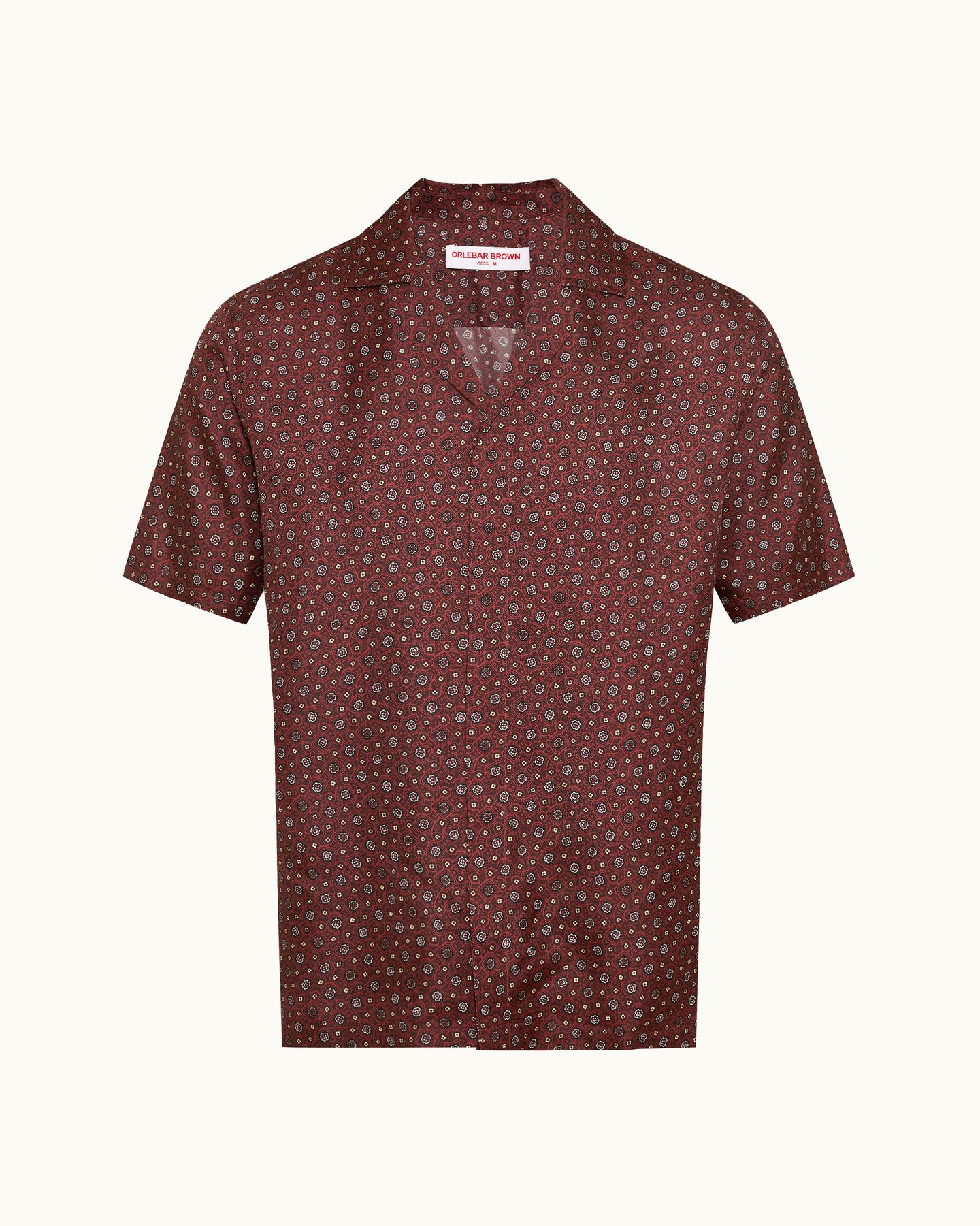 Short-sleeve shirt with a subtle pattern on a white background