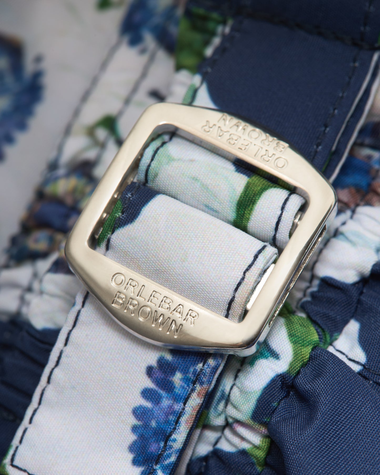 Russell - Kids Coronaria Print Swim Shorts in Night Iris Detail Buckle View