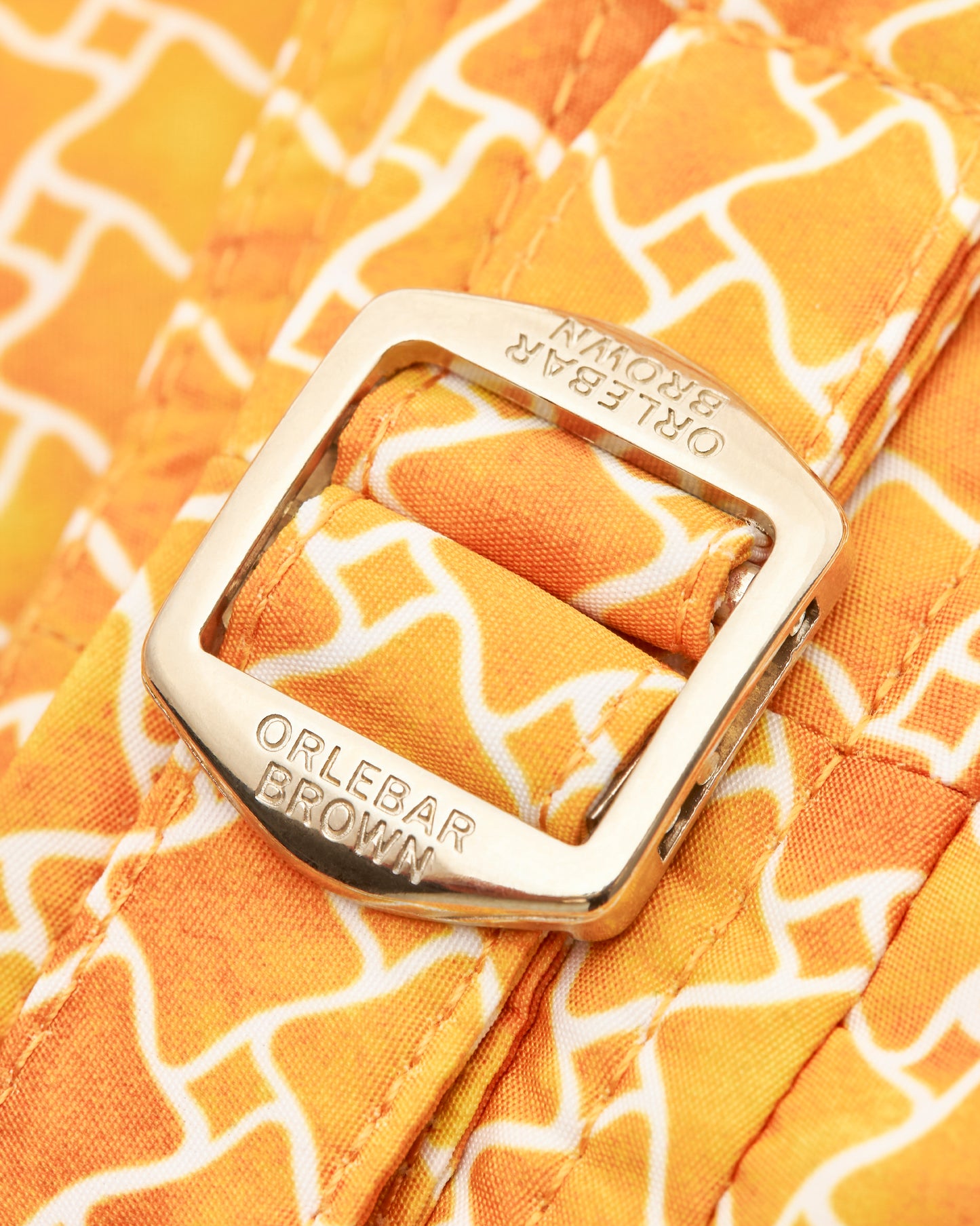 Setter - Shorter-Length Geo Print Swim Shorts in Calypso Orange Detail Buckle