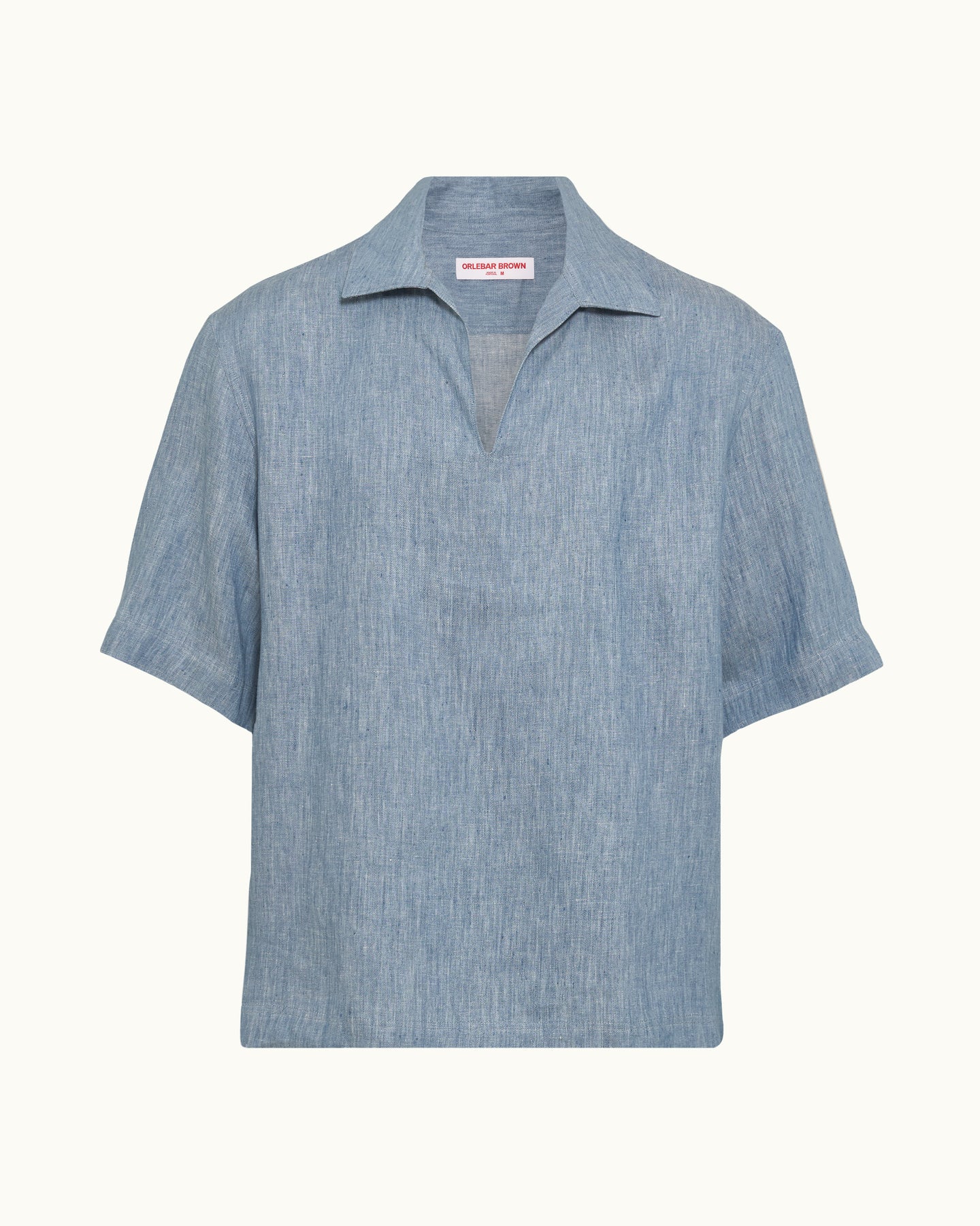 Blue short sleeve shirt on a plain background