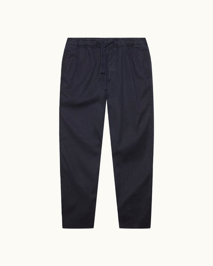 Alex Garment Dye - Relaxed Fit Garment Dye Cotton Trousers in Night Iris Front View