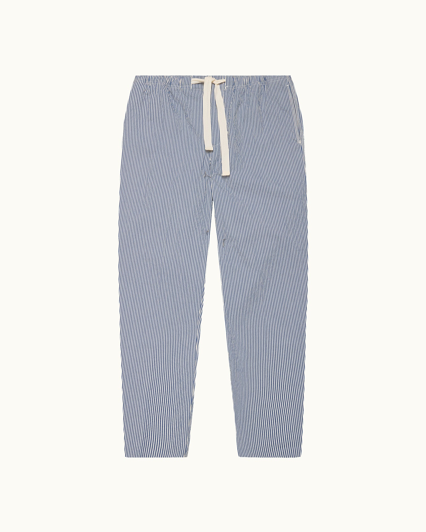 Blue and white striped pants with a drawstring on a white background