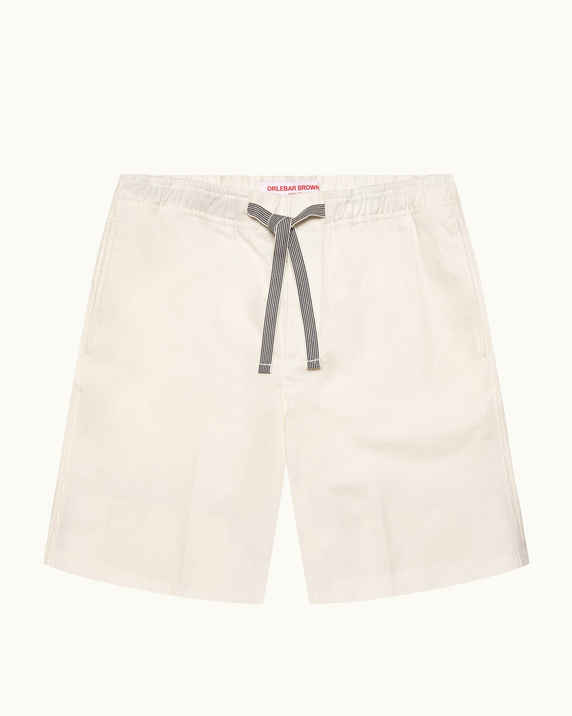 Beige shorts with drawstring on a white background