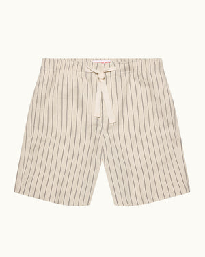 Beige pinstripe shorts on a white background