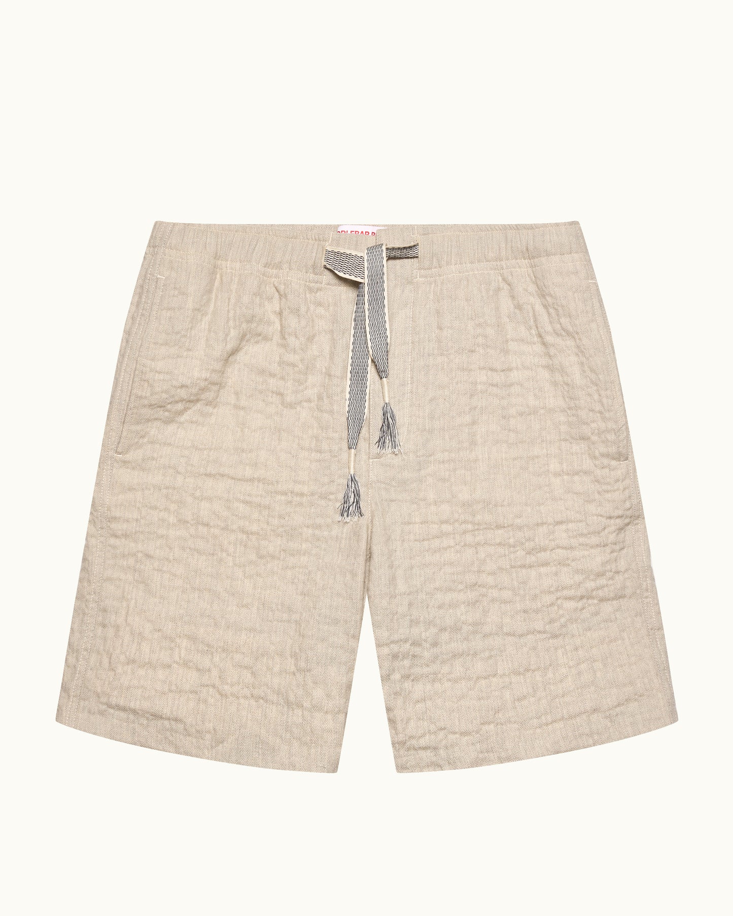 Beige shorts with a drawstring on a white background