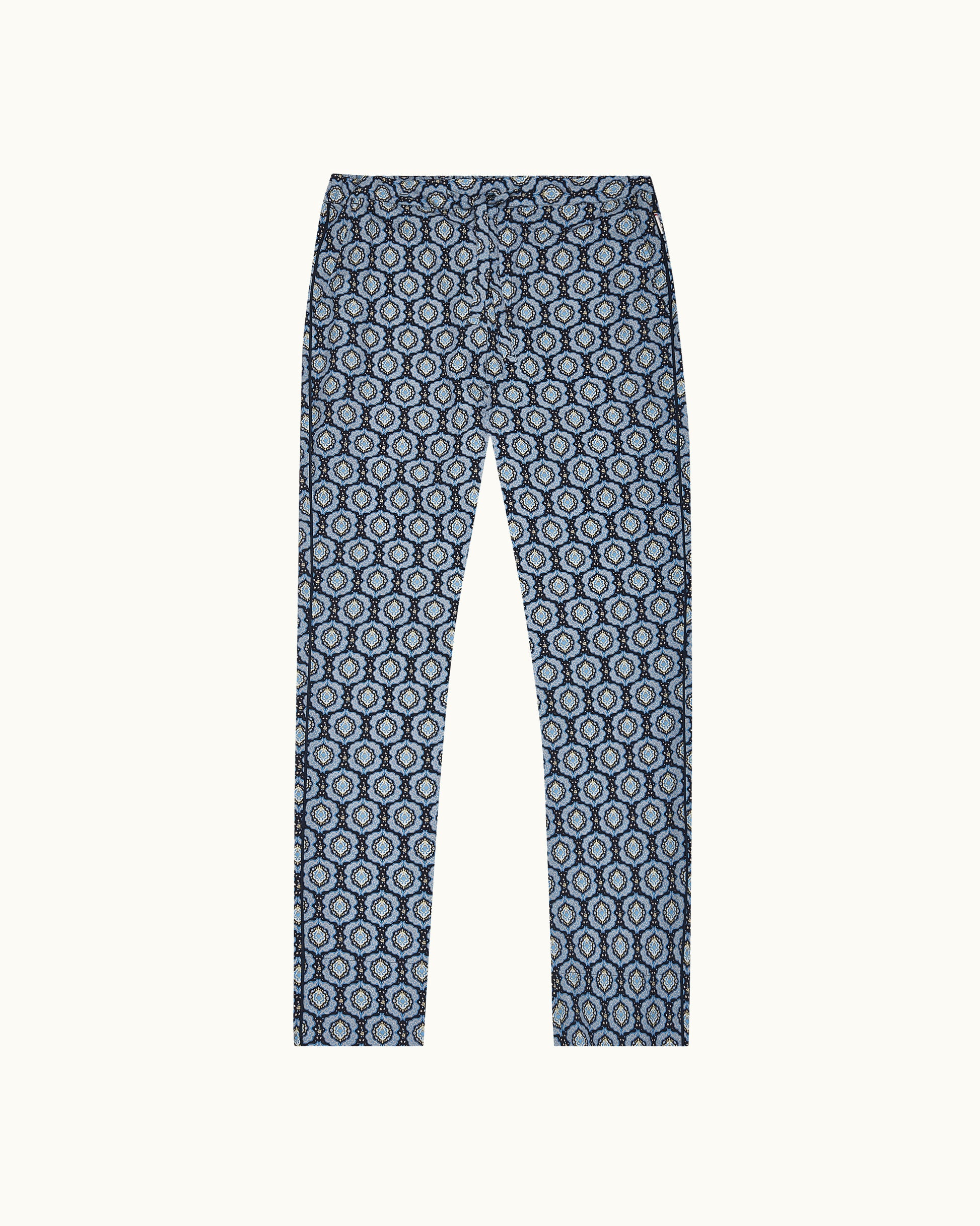 Blue patterned pants on a white background