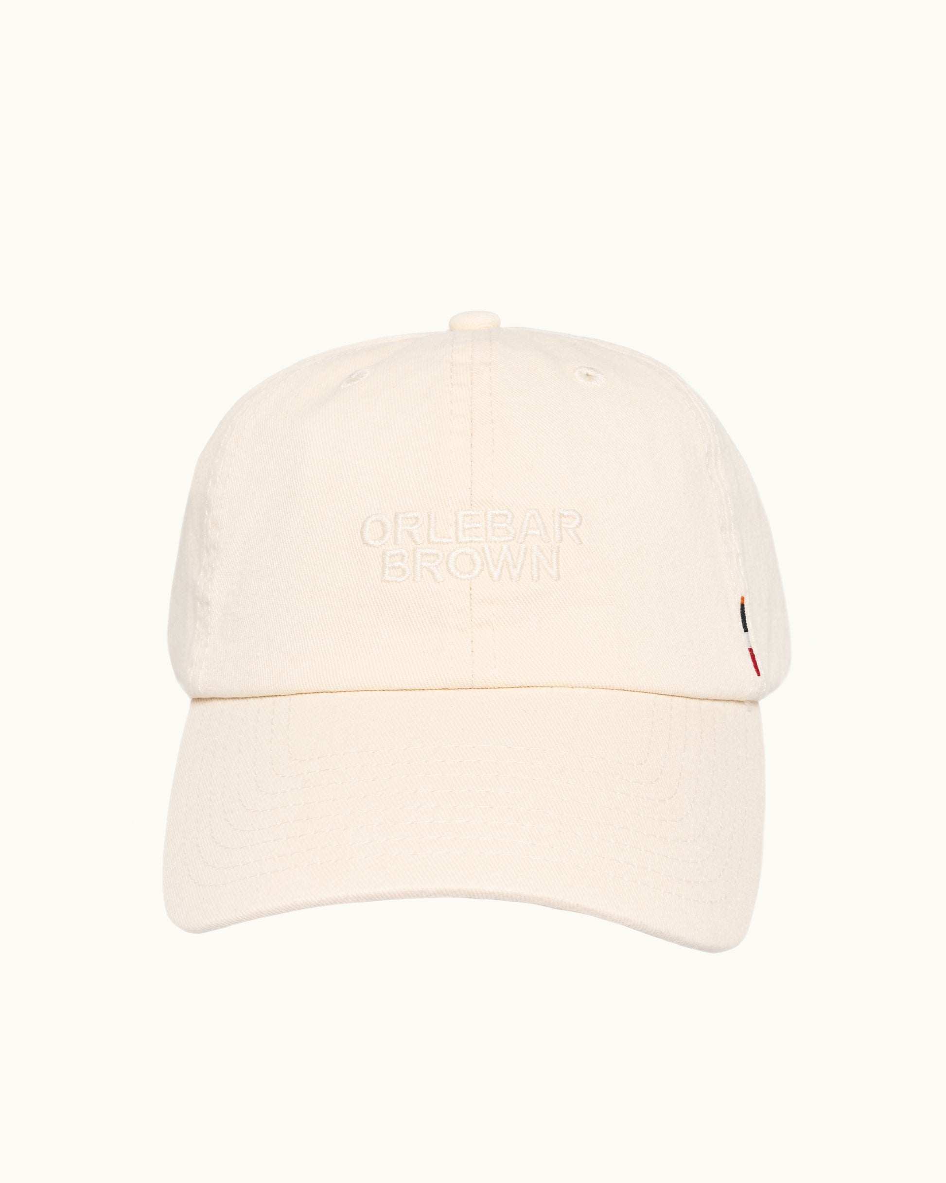 Beige baseball cap on a white background