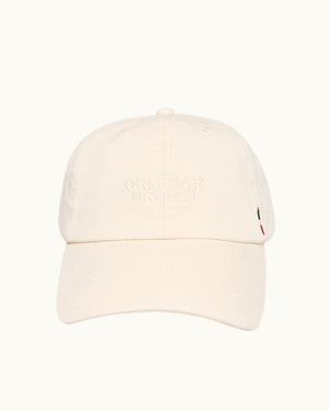 Beige baseball cap on a white background