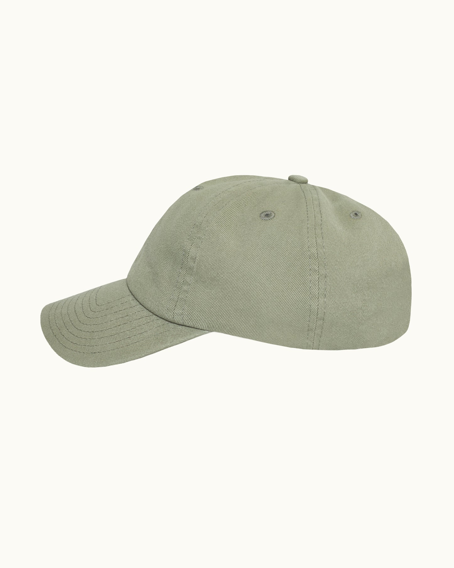 Green baseball cap on a plain background