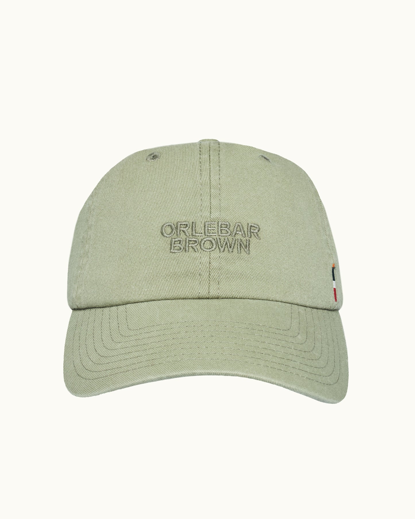 Green cap with 'Orlebar Brown' branding on a white background