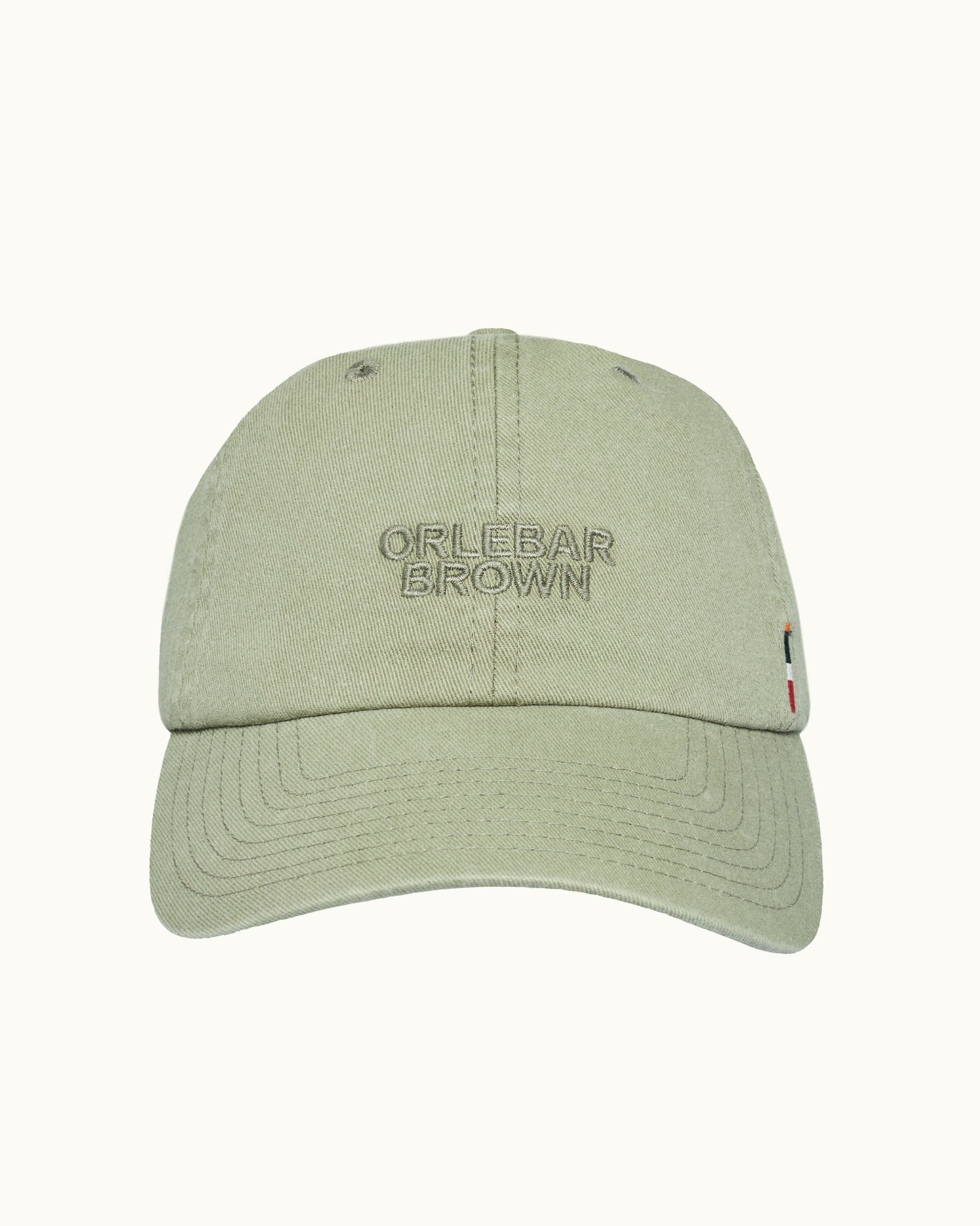Green cap with 'Orlebar Brown' branding on a white background