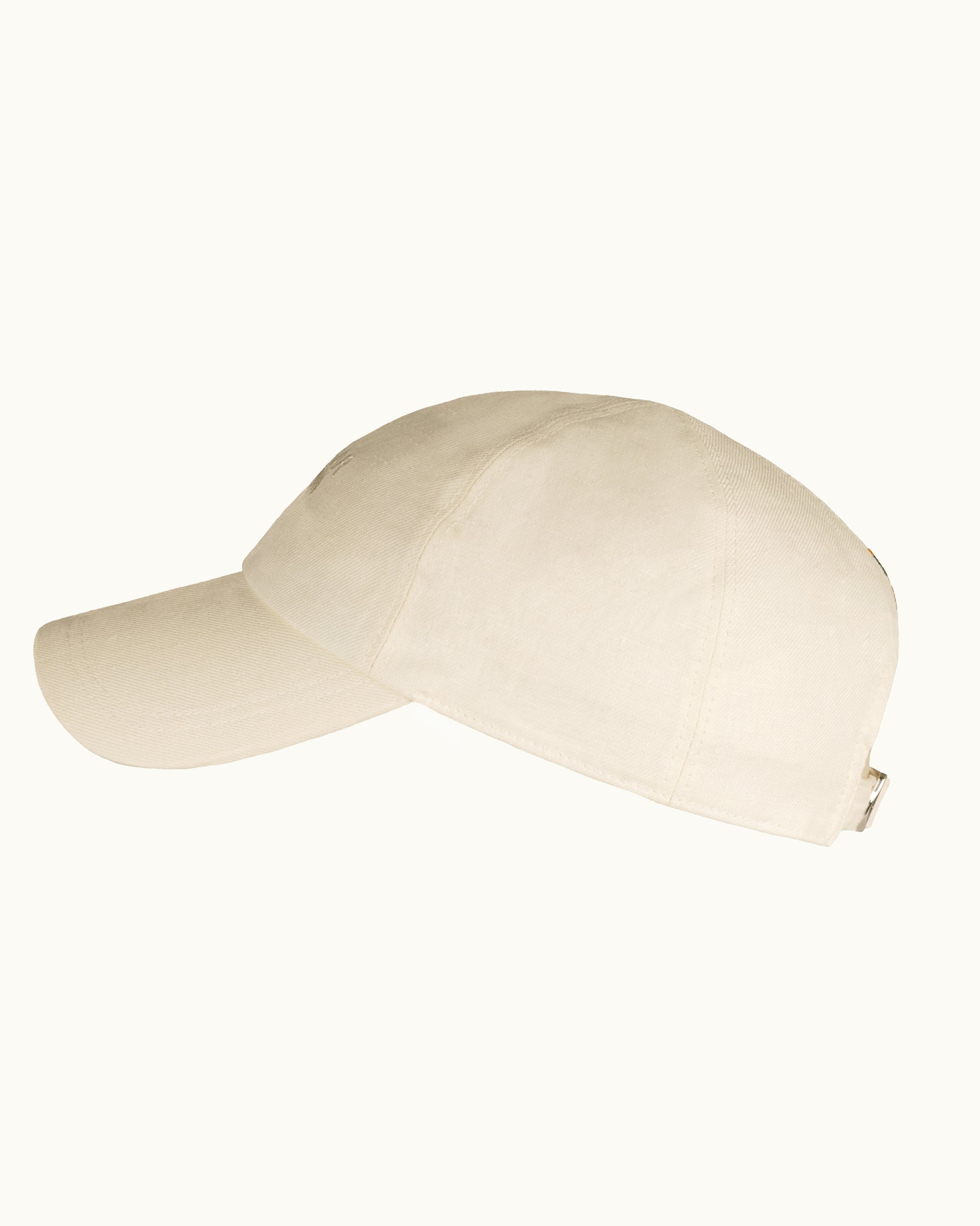 Light beige baseball cap on a white background
