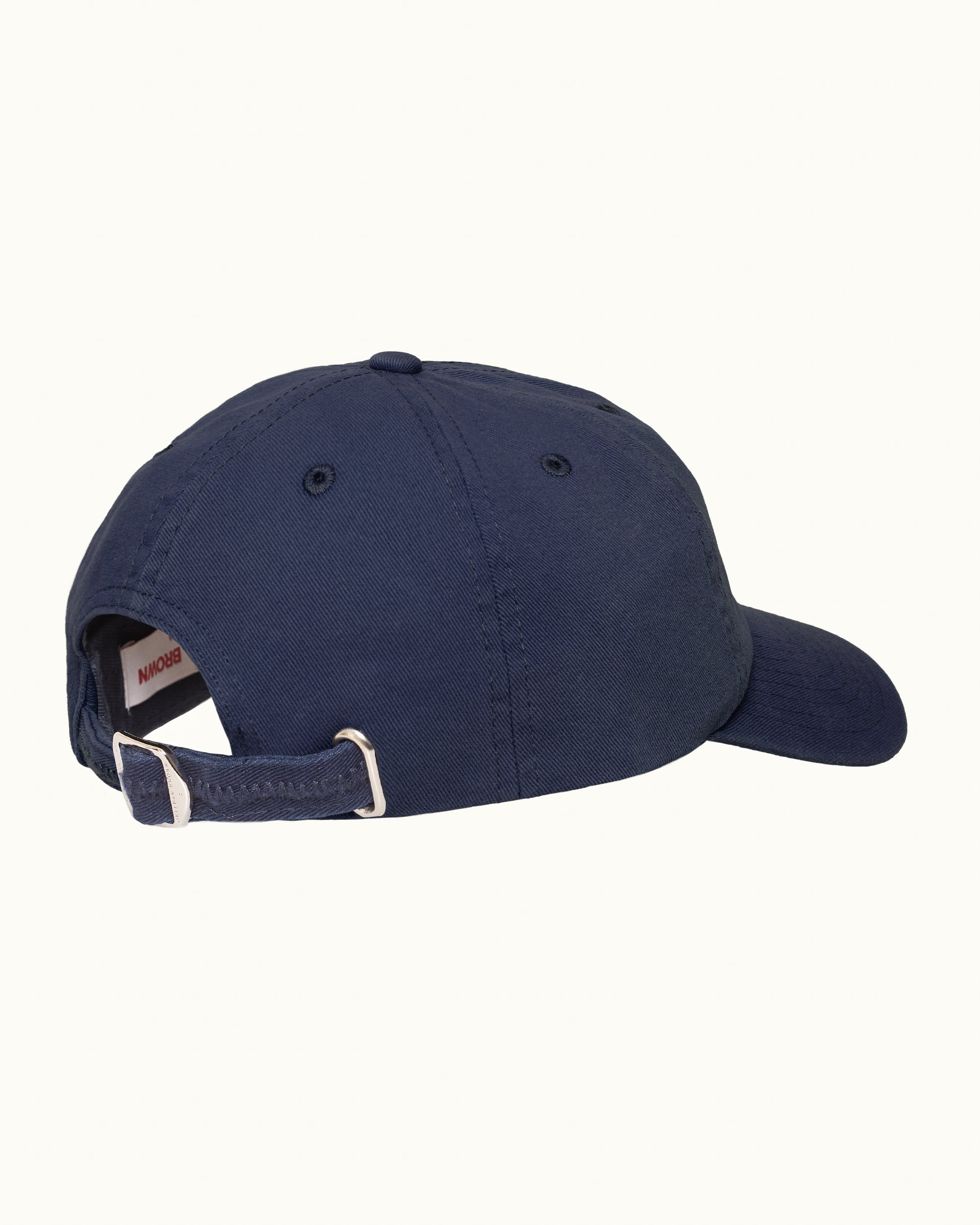 Navy blue baseball cap on a white background