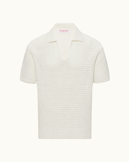 White textured polo shirt on a white background