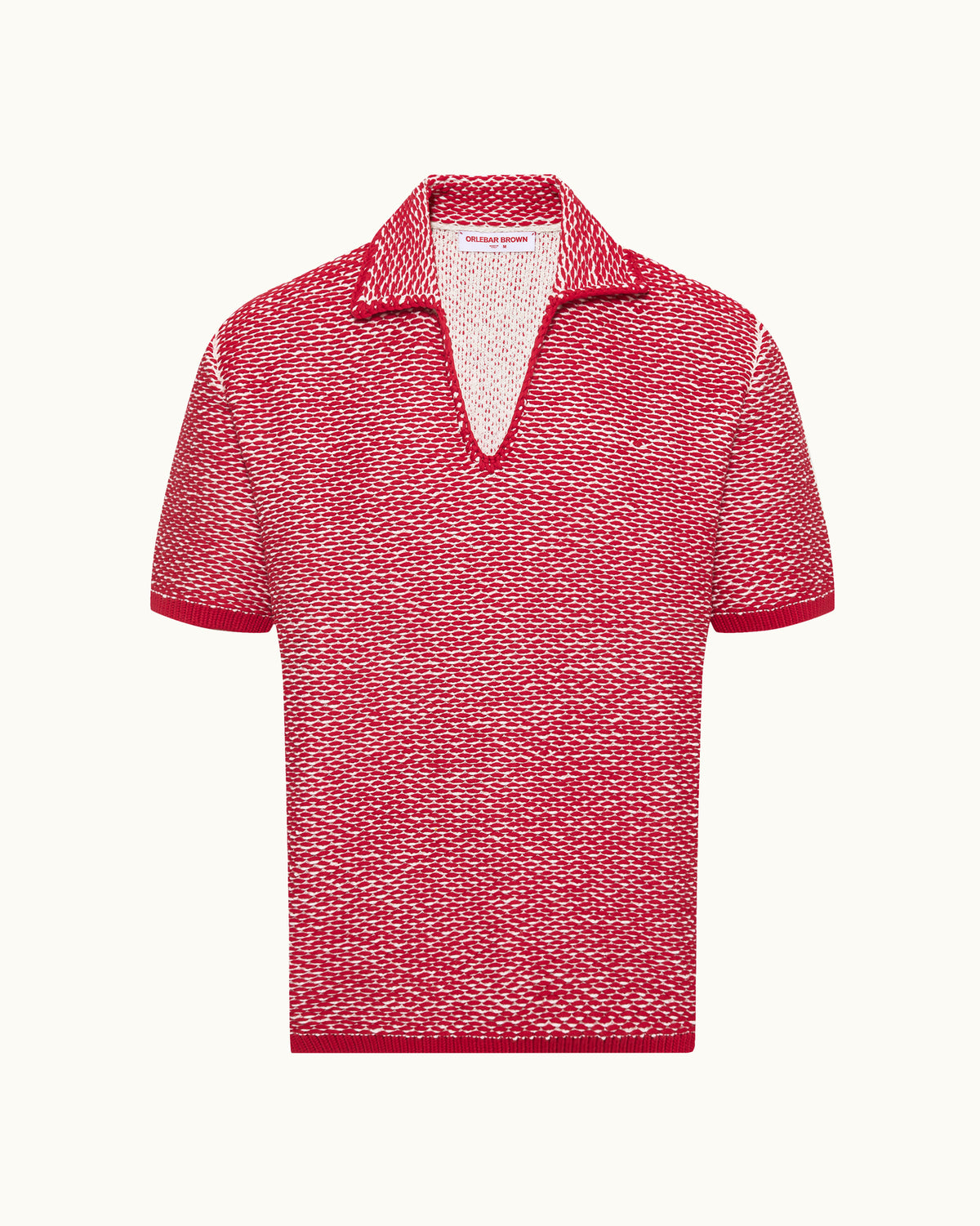 Red and white crochet stitch polo shirt on a plain background