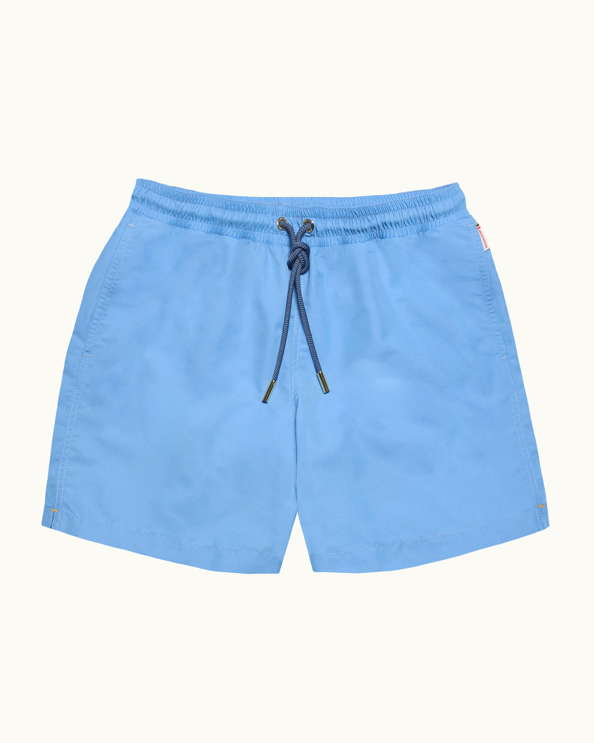 Bright blue swim shorts with drawcord waist on a plain background