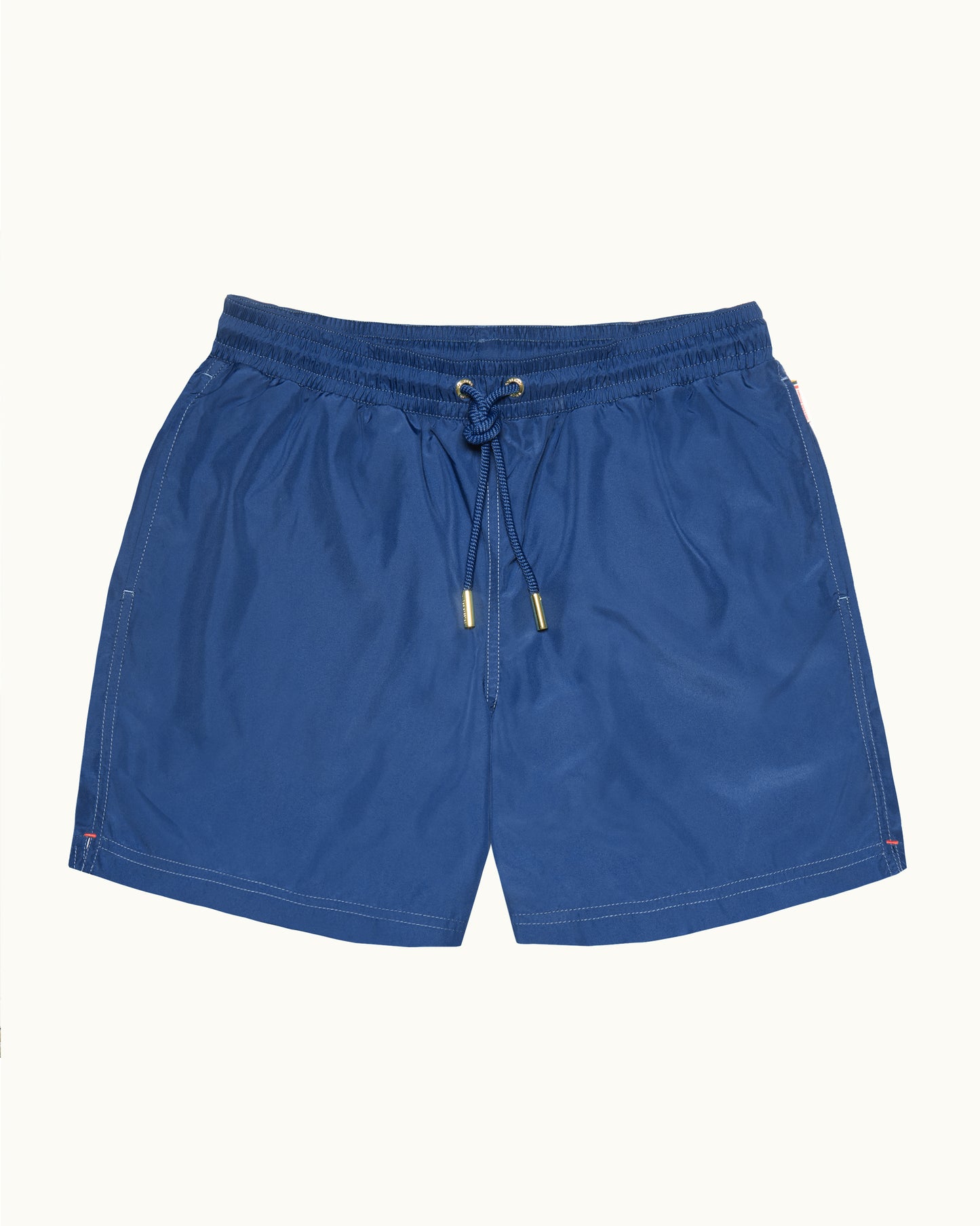 Blue shorts with a drawstring on a white background