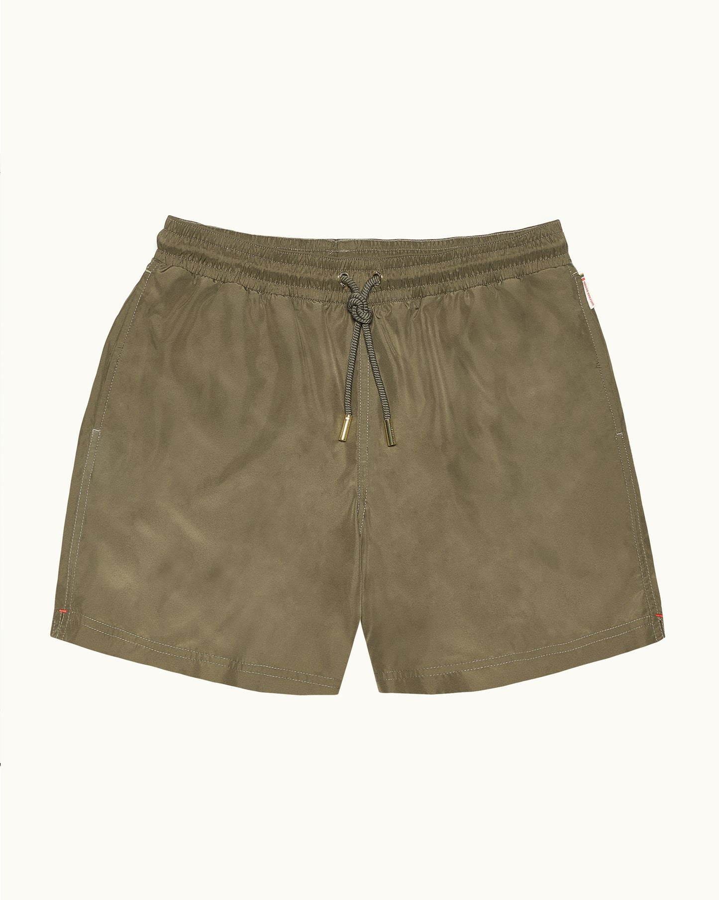 Khaki shorts with a drawstring on a white background