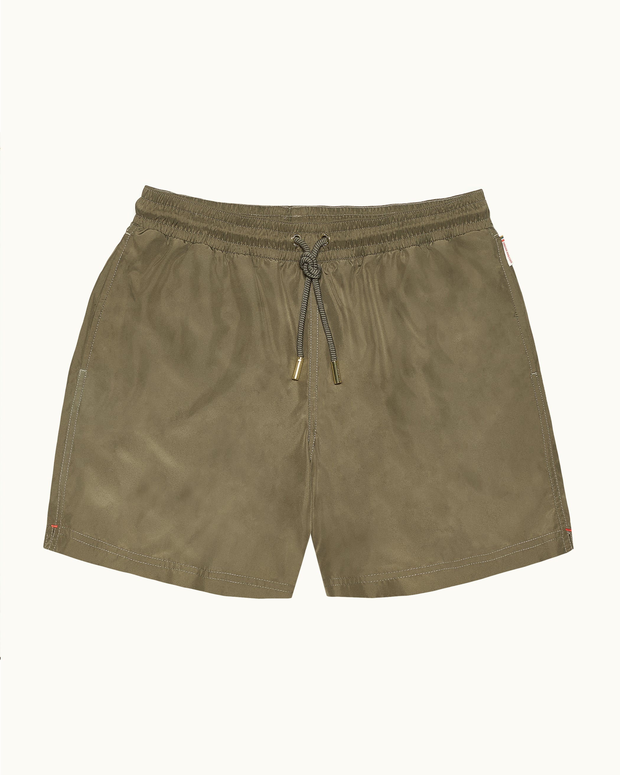 Khaki shorts with a drawstring on a white background