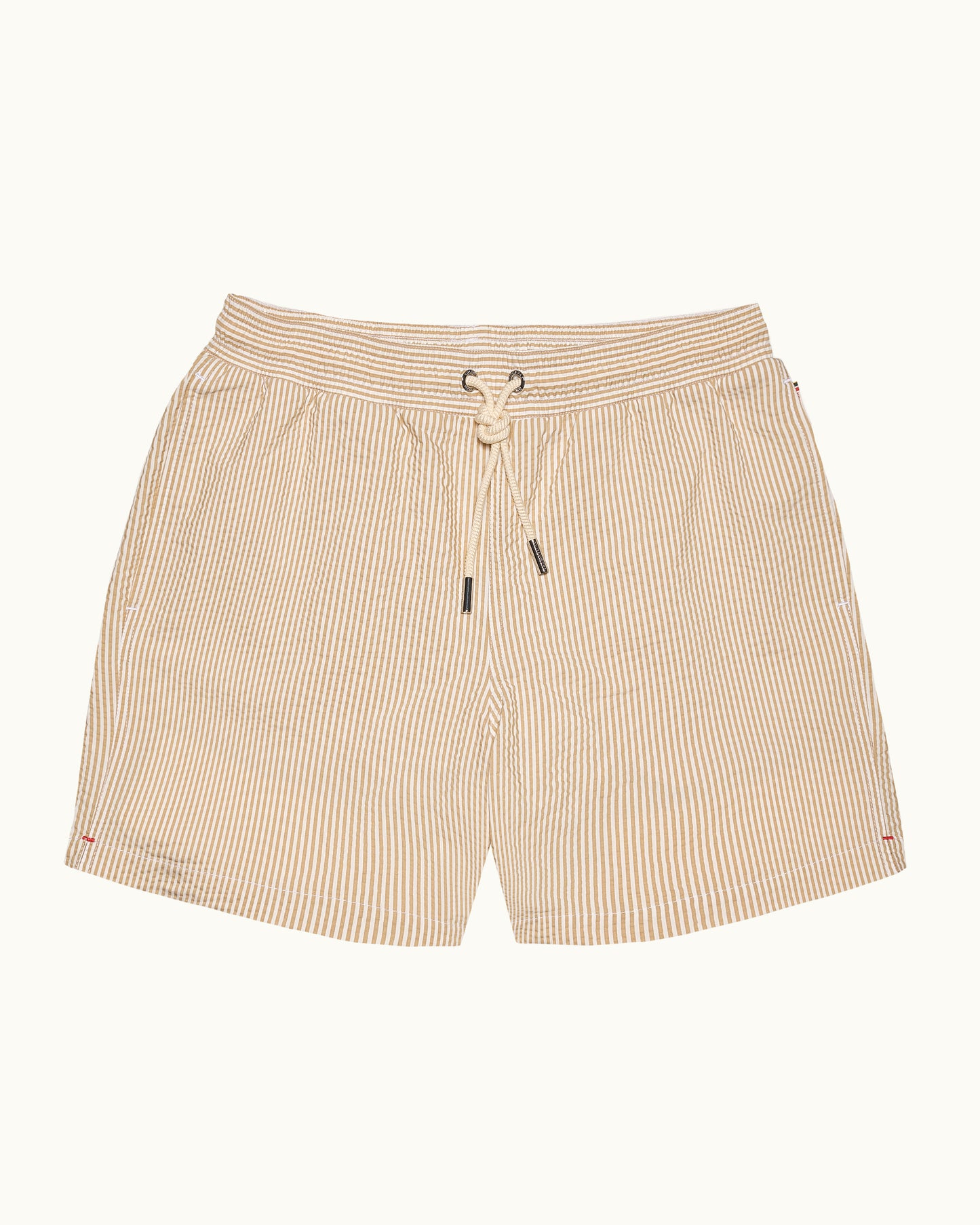 Beige striped shorts with a drawstring on a white background