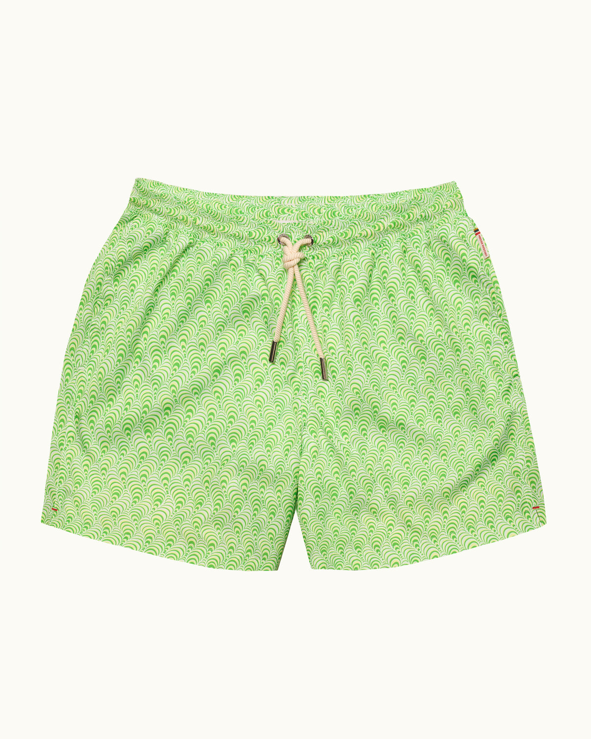 Green multicoloured swim shorts with drawstring waist on a plain background