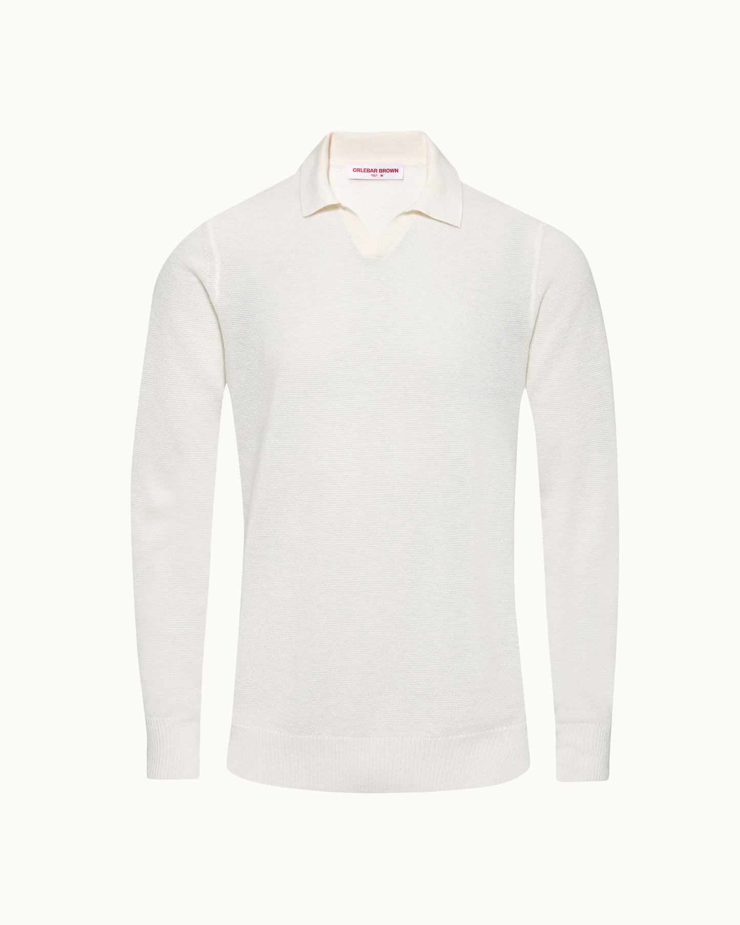 A long-sleeve knit polo sweater in off-white, displayed on a clean, solid, very light cream background.
