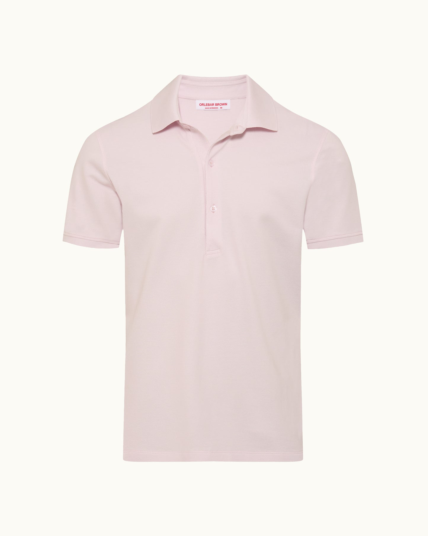 Pink polo shirt on a white background