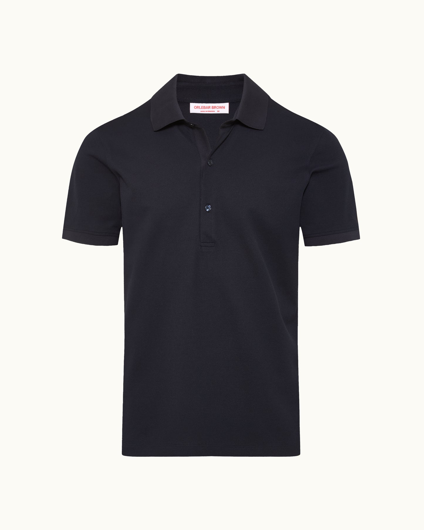 Navy polo shirt on a plain background
