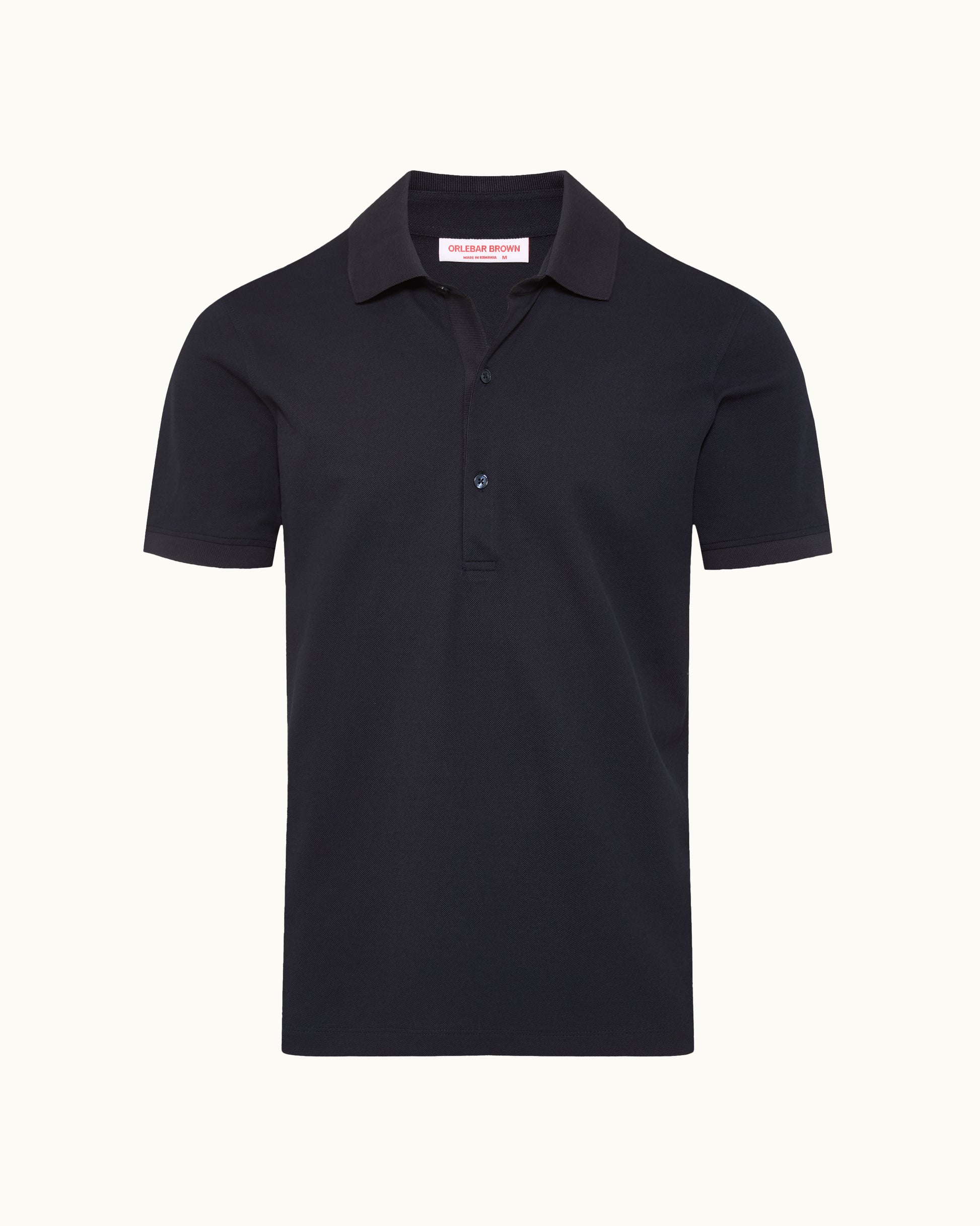 Navy polo shirt on a plain background
