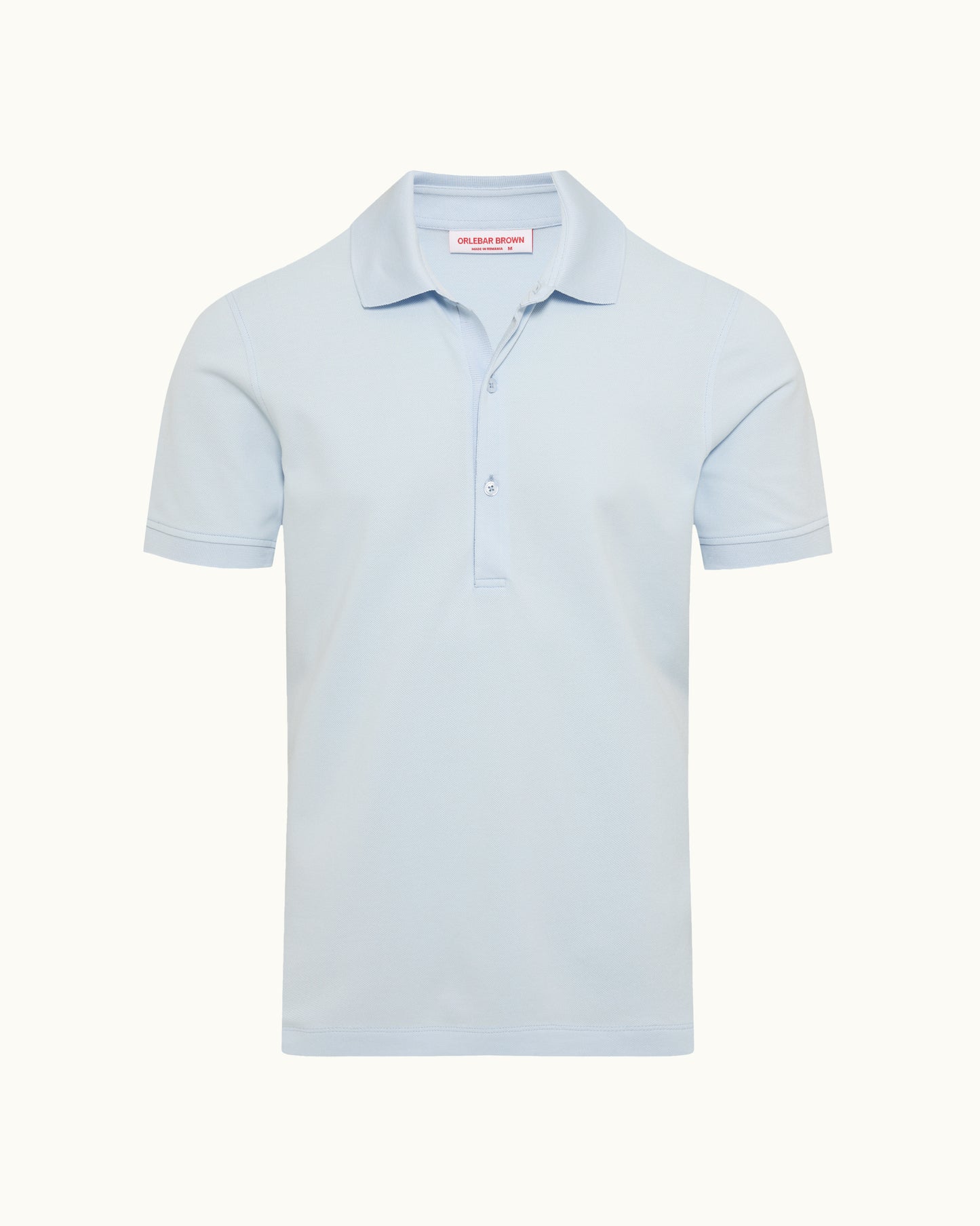 Light blue polo shirt on a plain background