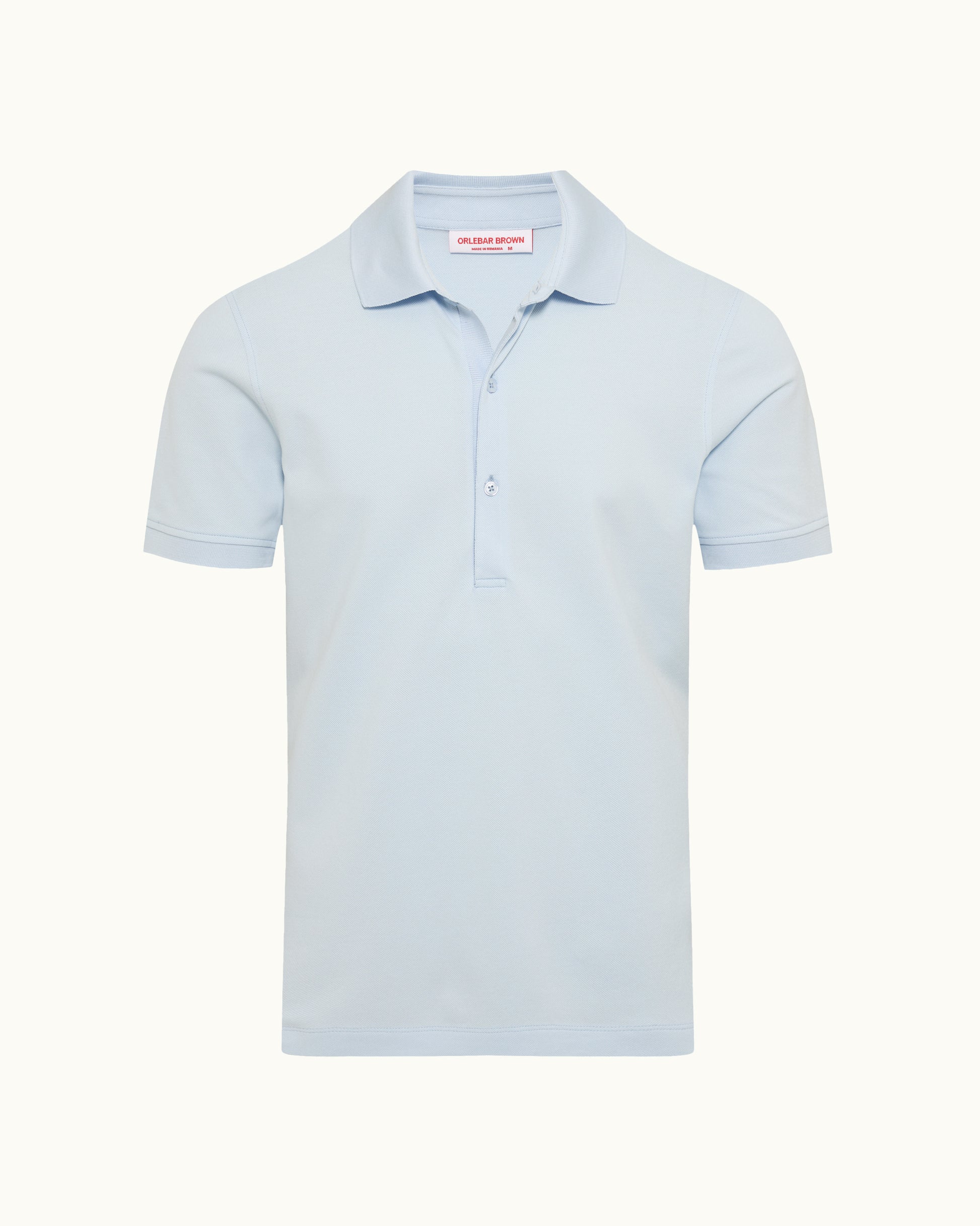 Light blue polo shirt on a plain background