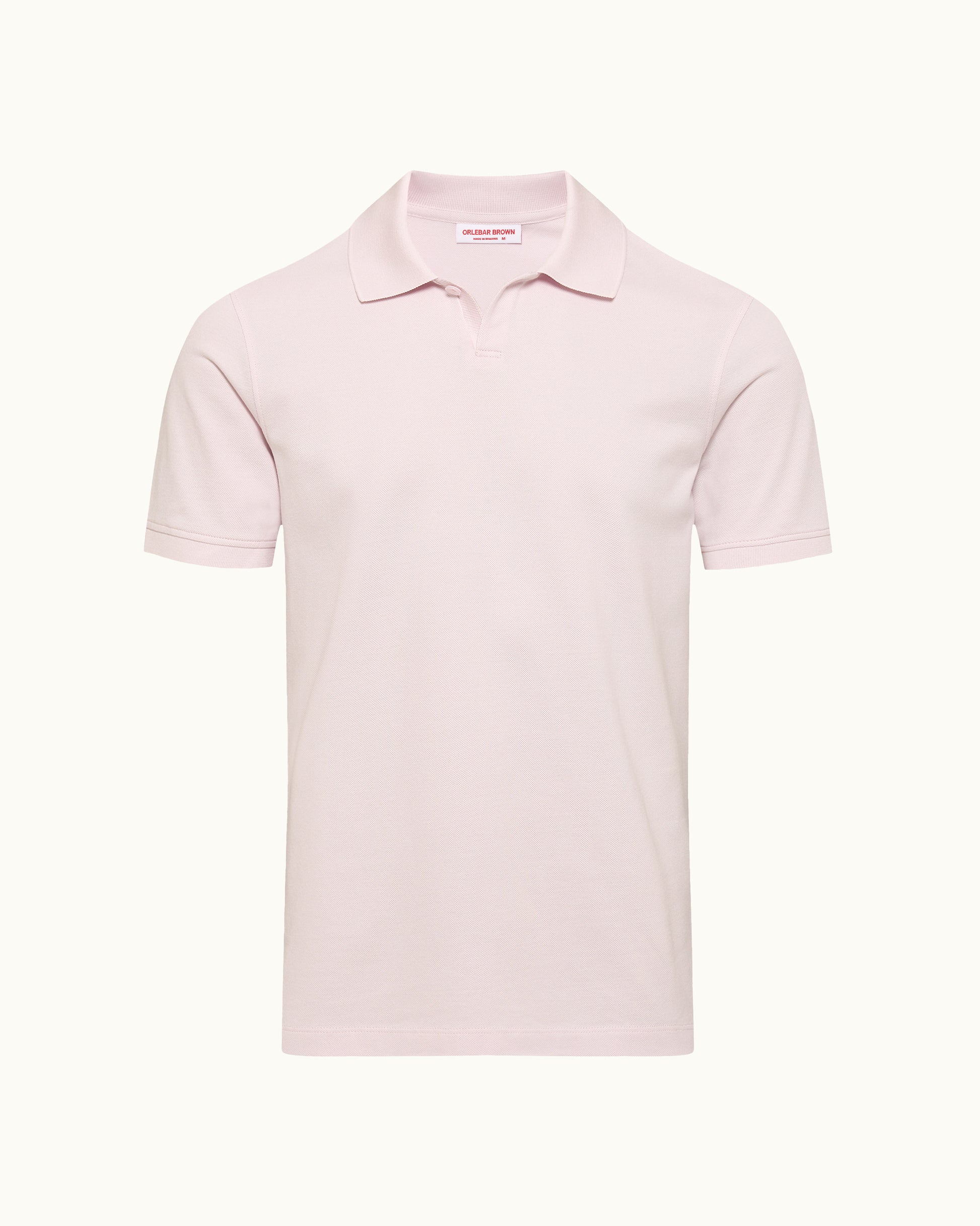 Pink polo shirt on a white background
