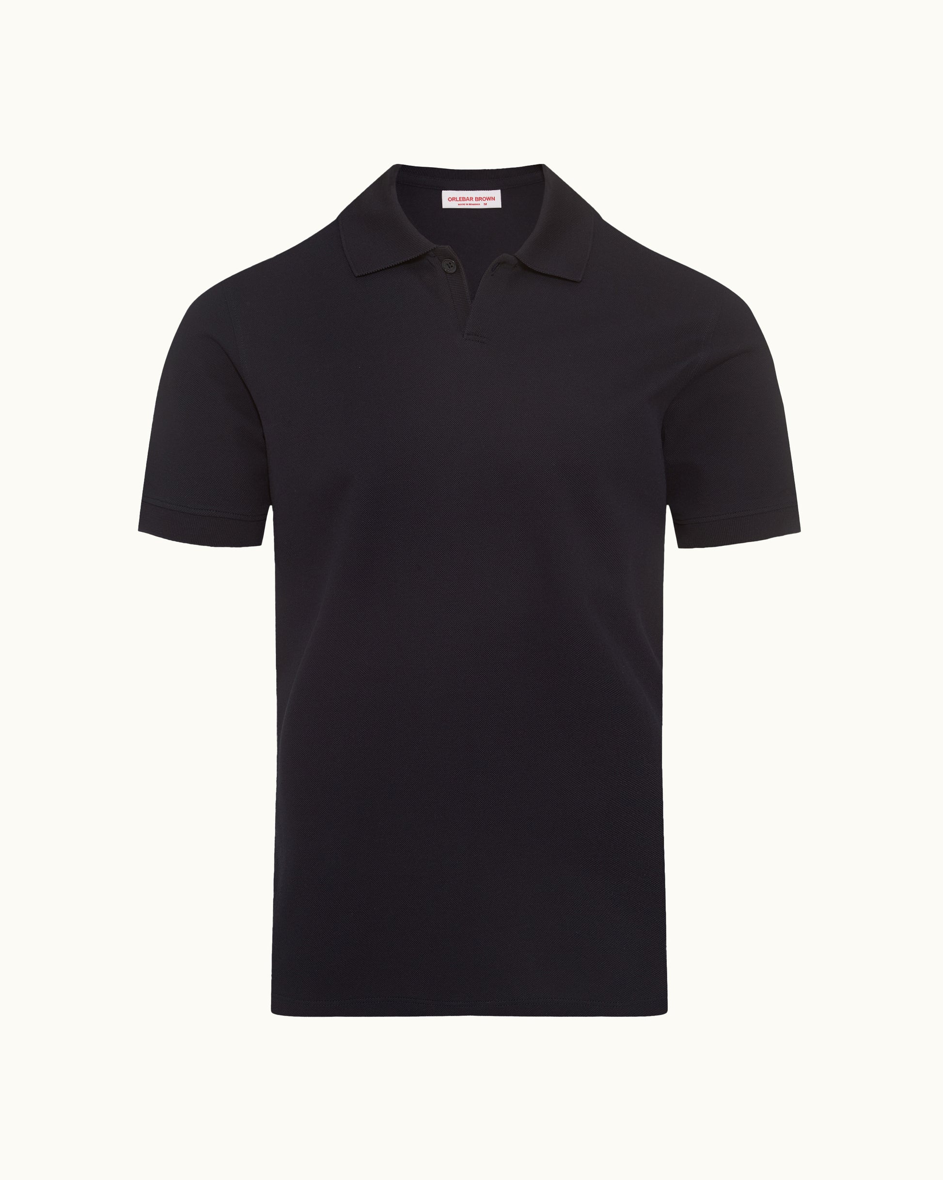 Dark navy polo shirt on a plain background