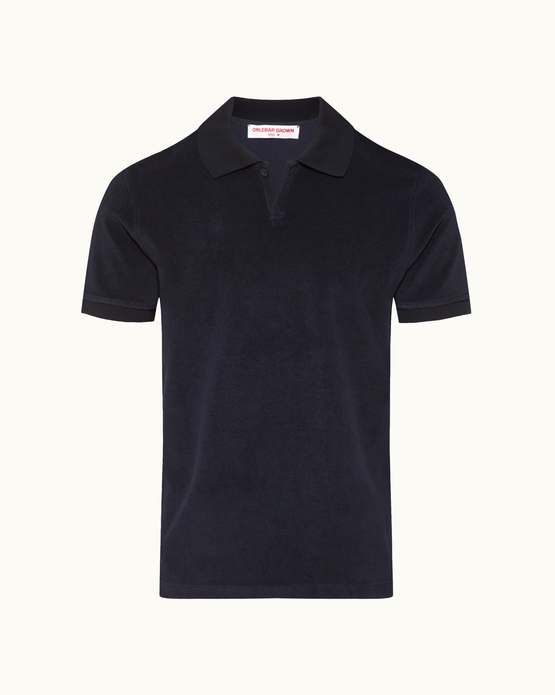 Navy blue polo shirt with a brand label on a white background