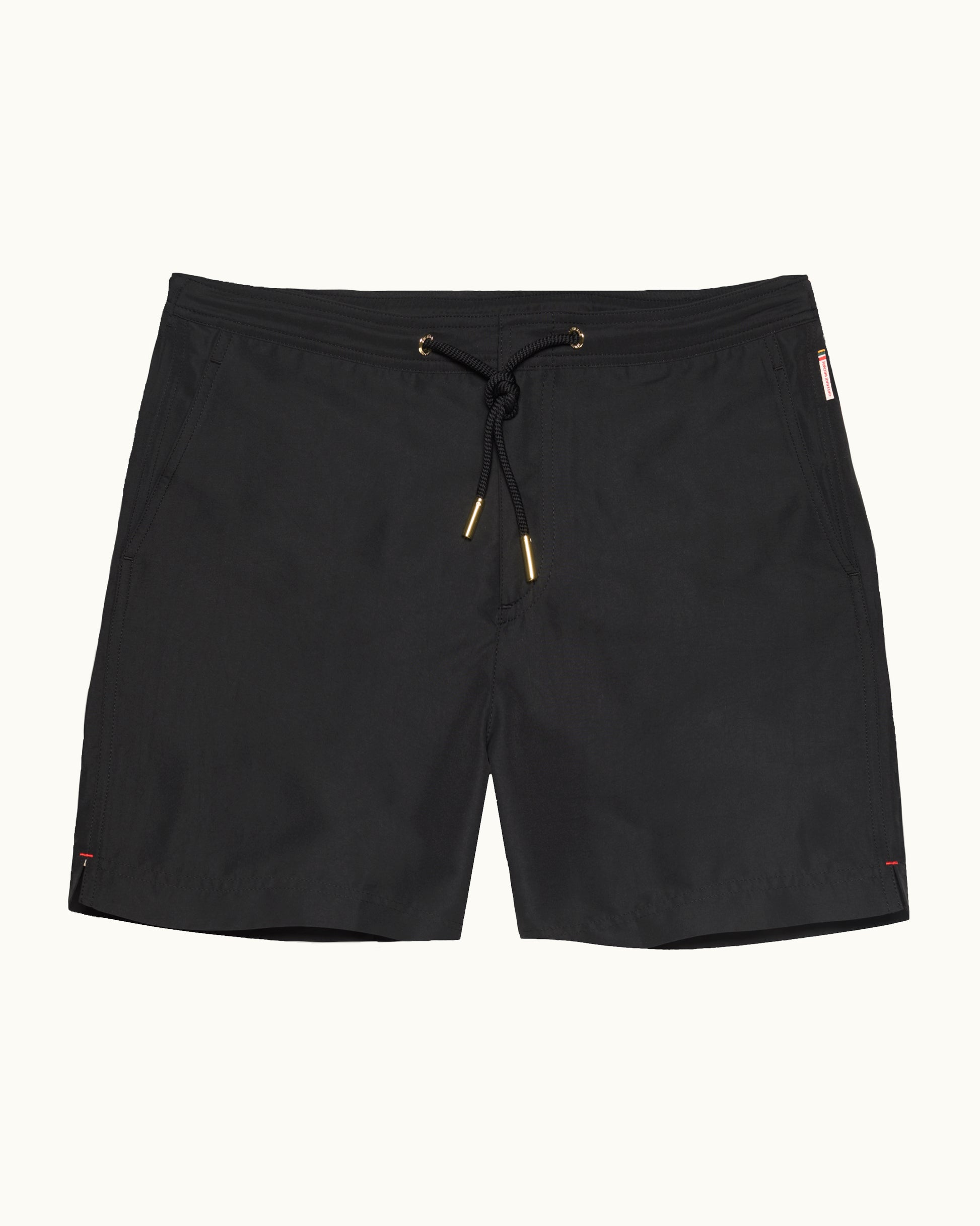 Black shorts with drawstring on a white background