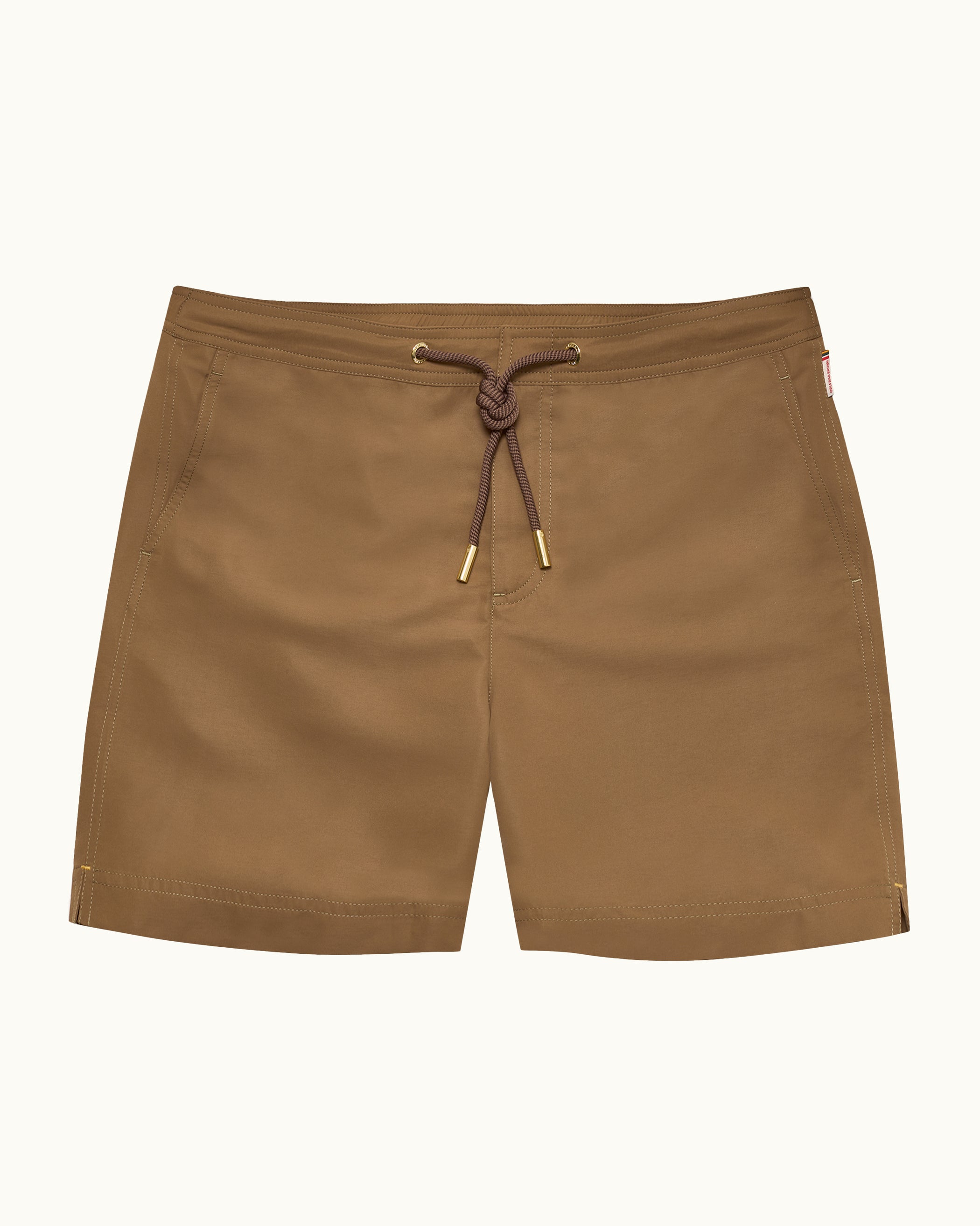 Brown shorts with a drawstring on a white background