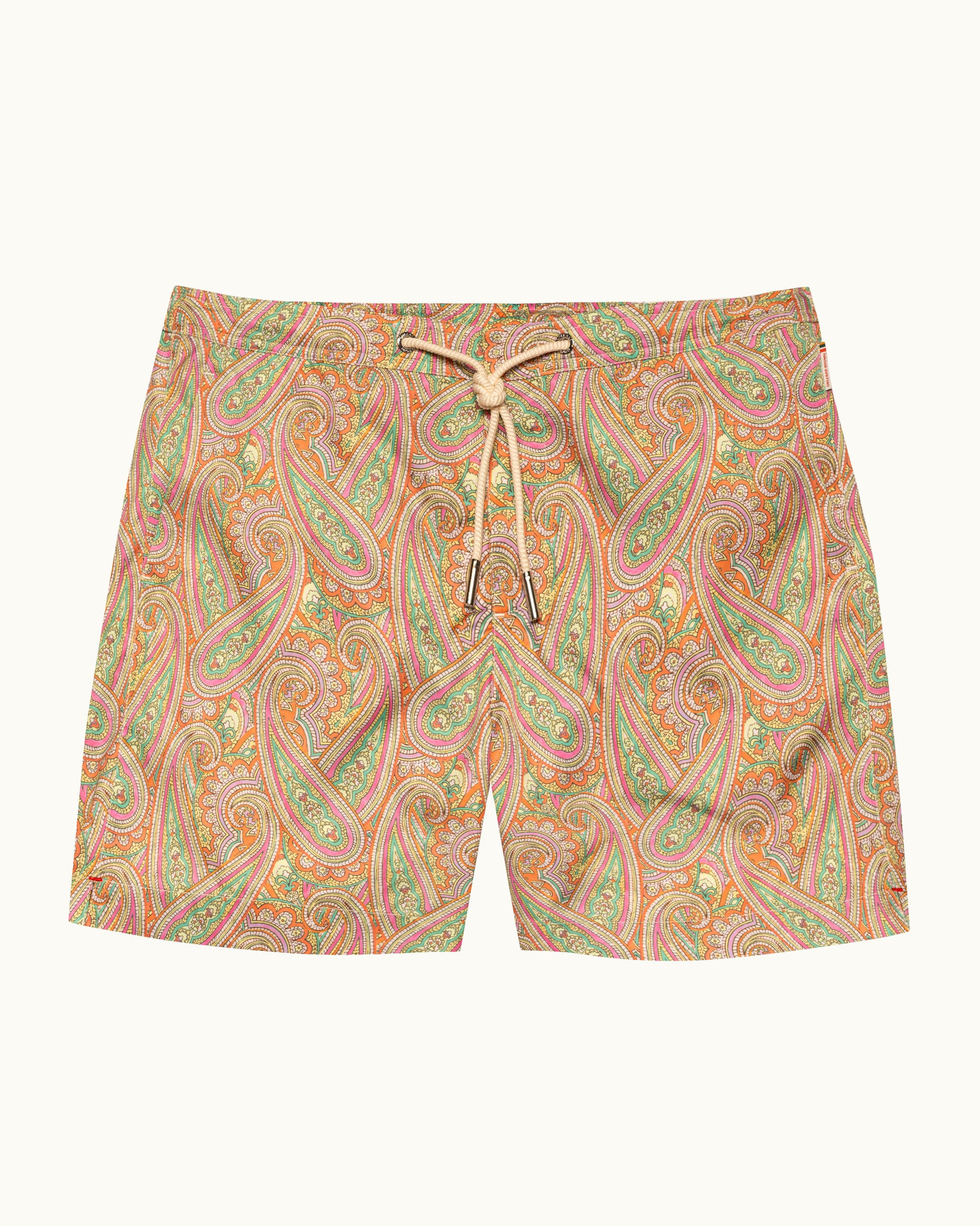Paisley patterned shorts on a white background