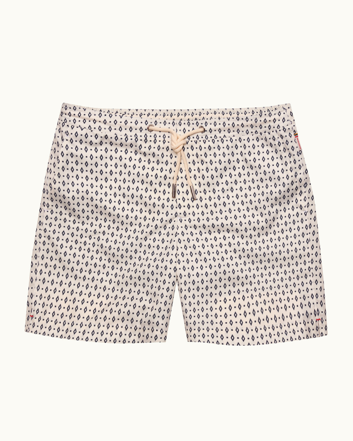 Beige patterned drawcord swim shorts on a white background