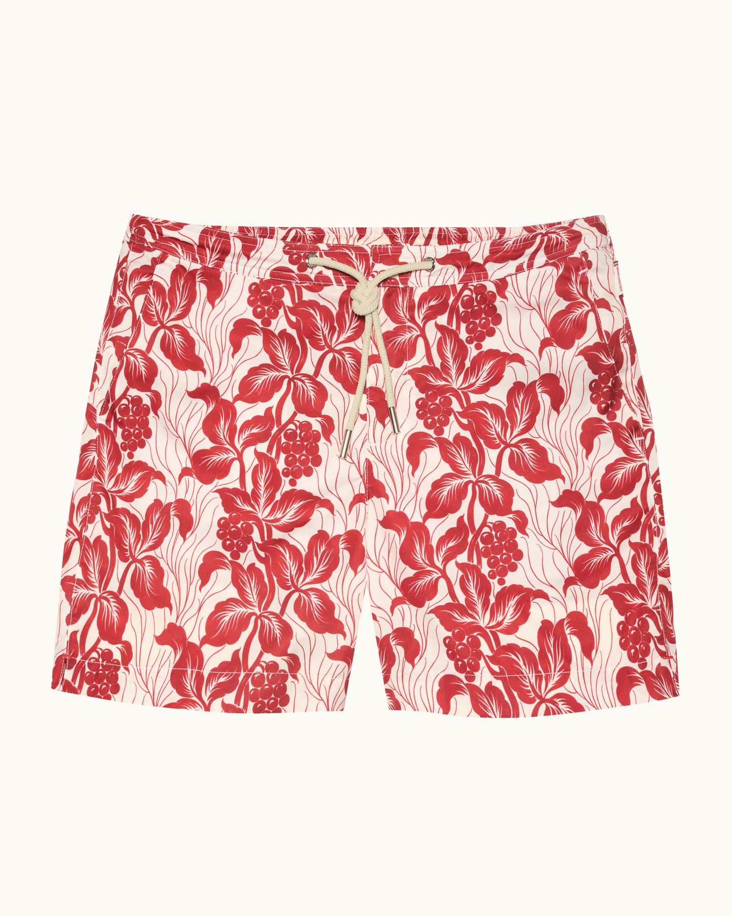 Red floral patterned shorts on a white background