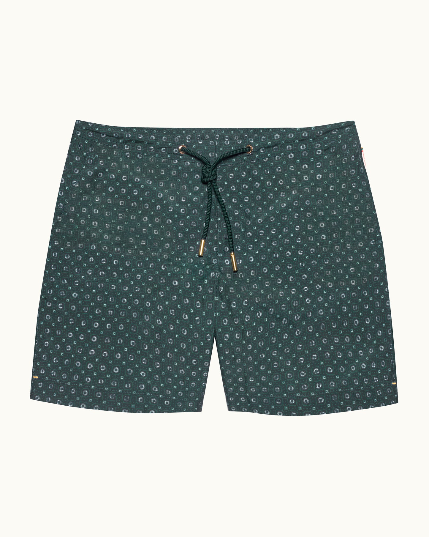 Green patterned shorts on a white background