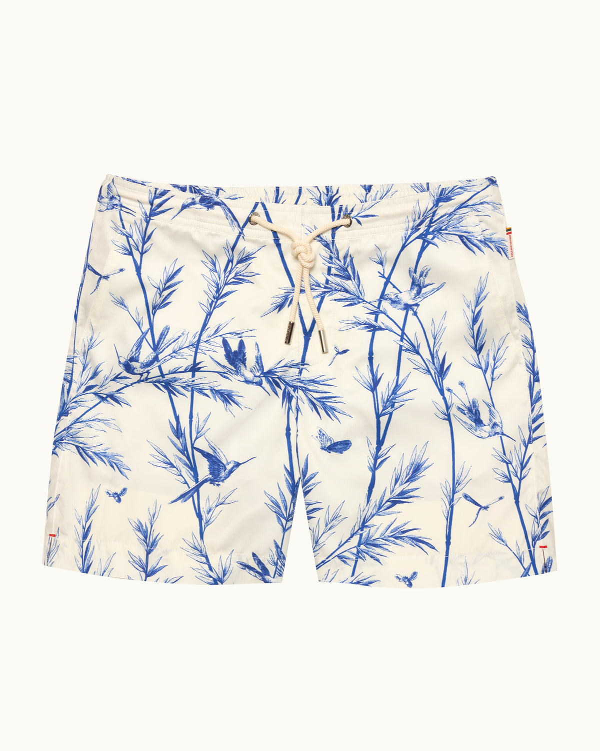 White drawcord-waist swim shorts featuring a blue pattern on a white background