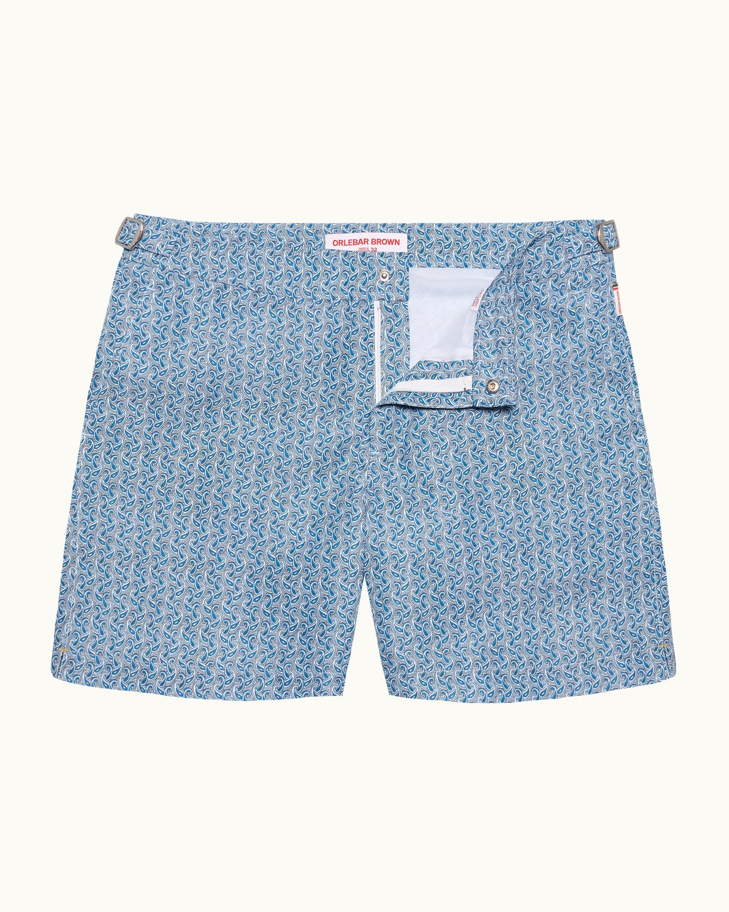 Blue patterned shorts with a visible brand logo on a white background