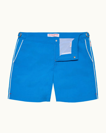 Blue shorts with white side stripes on a white background