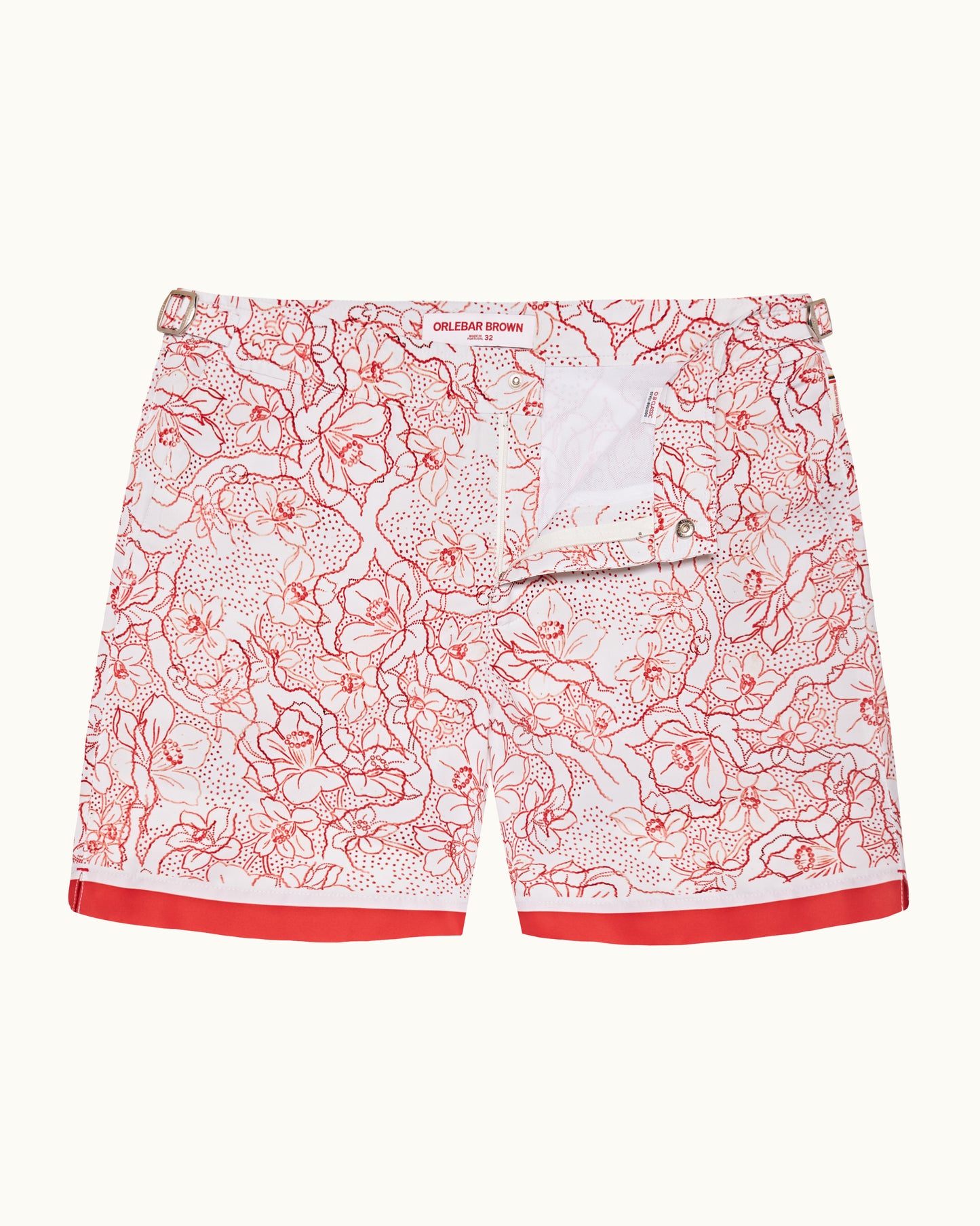 Red and white patterned shorts on a white background
