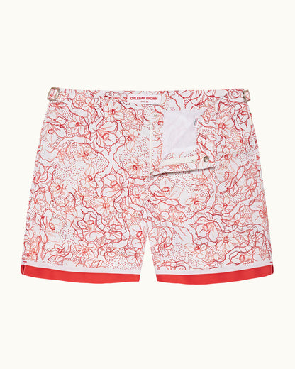 Red and white patterned shorts on a white background