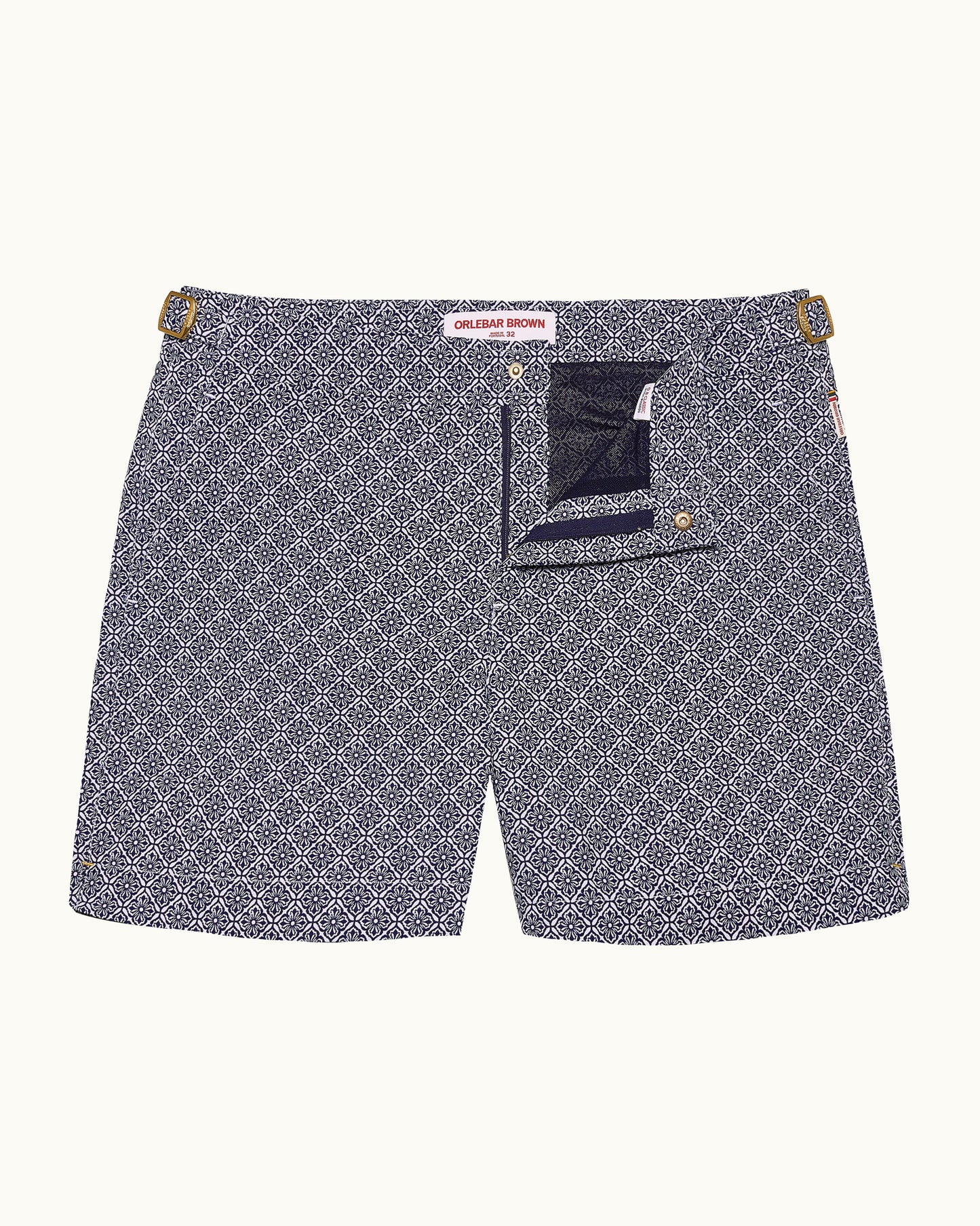 Patterned shorts with a visible brand label on a white background